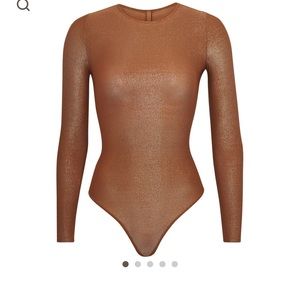 SKIMS sheer shimmer bodysuit new with tags!